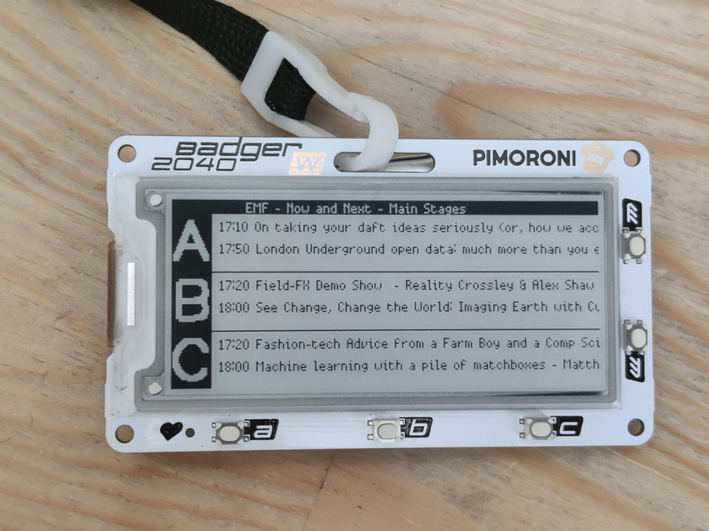 Screenshot of Badger 2040 W emfcamp Now Next running on Badger 2040 (W/Original)